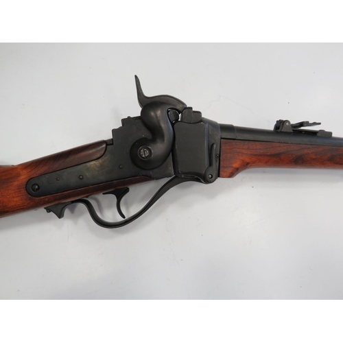 403 - Replica carbine rifle with cocking action and working trigger. Nice wooden stock. 39 inches long. Se... 