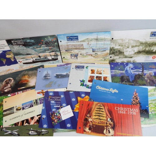 378 - 54 Guernsey Mint presentation packs. See photos.