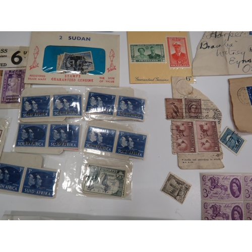 471 - Large selection of Vintage mint and franked UK and foreign stamps, Some in retailers packets. See ph... 