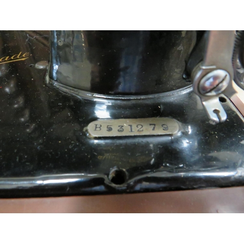 475 - Vintage Jones 'Empress' Sewing machine with original leather case. Serial number R5315279.