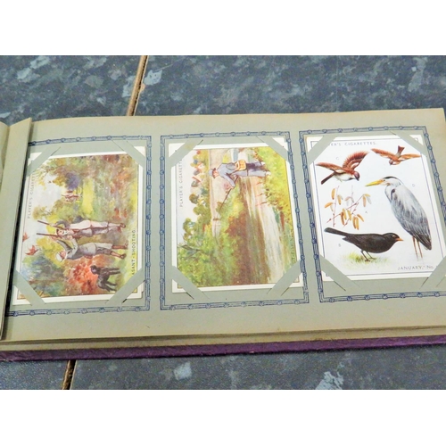 508 - Part filled album of vintage (1930's) era cigarette cards by Players to include 'Portals from the Pa... 