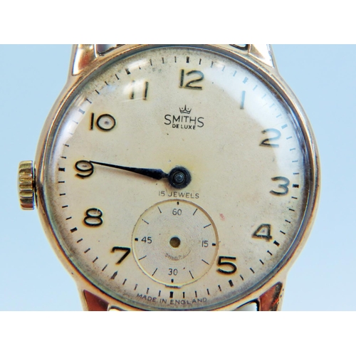 517 - Smiths De-lux 15 jewel vintage watch with 9ct Yellow gold case, gold tone expanding strap. Non runne... 