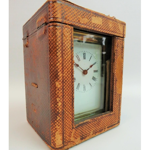 521 - Vintage Brass cased skeleton carriage clock with glass sides and top to show mechaninsm and escapeme... 