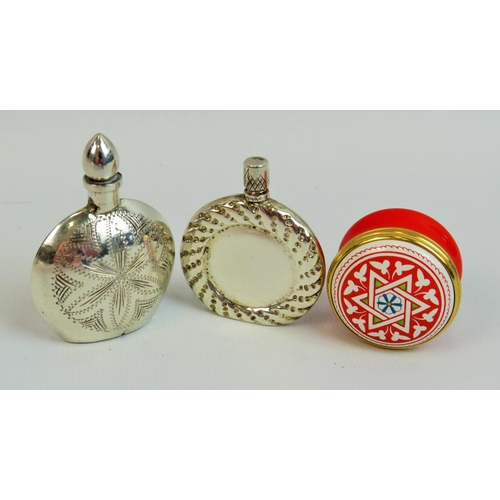 526 - Two Sterling silver scent bottles, each just two inches tall together with a Tiffany designed keepsa... 