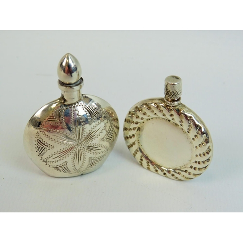 526 - Two Sterling silver scent bottles, each just two inches tall together with a Tiffany designed keepsa... 