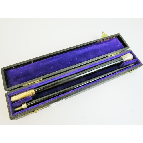 536 - 1940's Two piece conductors baton made from ebony with hallmarked silver fittings. Comes complete wi... 