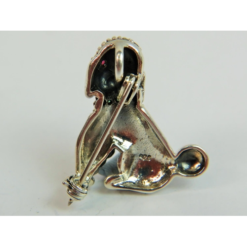 551 - Very Pretty 925 silver and marcasite brooch/pendant as a poodle with ruby coloured gemstone set eyes... 