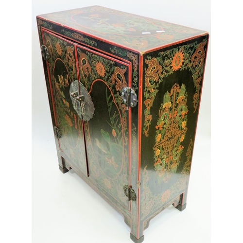 553 - Lovely Chinoiserie laquered cabinet with double door. Beautiful decoration to three sides showing Bi... 