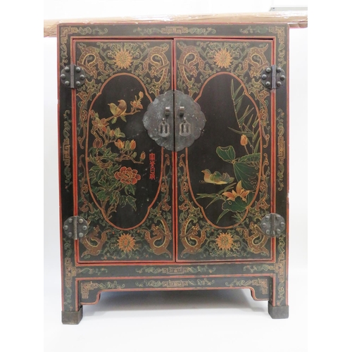 553 - Lovely Chinoiserie laquered cabinet with double door. Beautiful decoration to three sides showing Bi... 