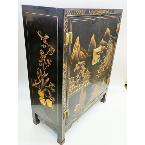 554 - Lovely Chinoiserie laquered cabinet with double door. Beautiful decoration to three sides showing Mo... 