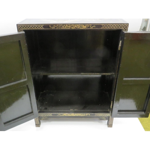 554 - Lovely Chinoiserie laquered cabinet with double door. Beautiful decoration to three sides showing Mo... 