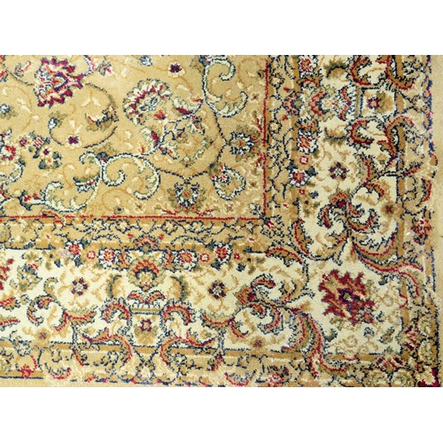 557 - Dunelm Oriental style 100% Polypropylene rug. Measures 80 x 150cms See photos.