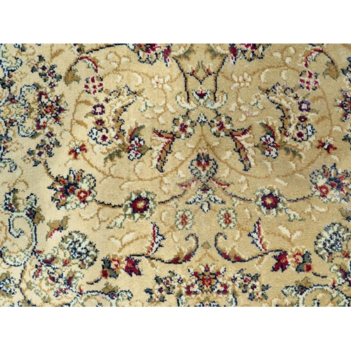 558 - Dunelm Oriental style 100% Polypropylene rug. Measures 60 x 230cms See photos.