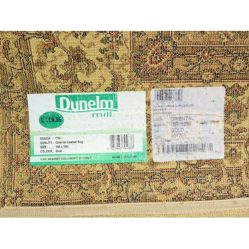 560 - Dunelm Oriental style 100% Polypropylene rug. Measures 160 x 230cms See photos.