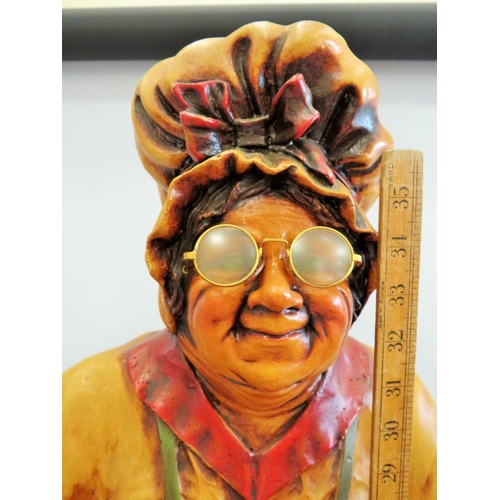 563 - Fibreglass waitress with mop cap. Approx 40 inches tall. See photos.