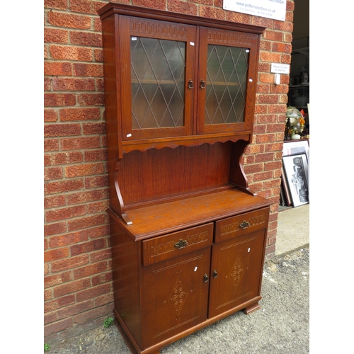 570 - 1950s/60's New Plan heavily built sideboard with leaded glass cupboards above. H:72 x W:37 X D:16 in... 