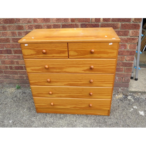 571 - Four drawer pine effect chest with two above. H:35 X W:33 X D:17 inches. See photos.