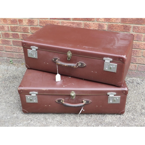 572 - Pair of leather effect, fibreboard suitcases with padded leather handles. Each H:10 X W:32 X D:18 in... 