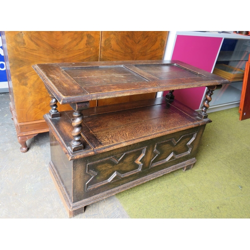 579 - Tudor Style dark oak Monks bench which converts to side table . H:29 X W:41 X D:19 inches . See phot... 