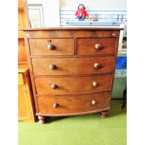 585 - Late 19th/Early 20th Century three drawer bow fronted three drawer chest with two above. Turned bun ... 