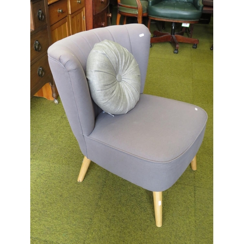 593 - nicely upholstered boudoir chair with cushion. Fire ticket fastened to base. See photo