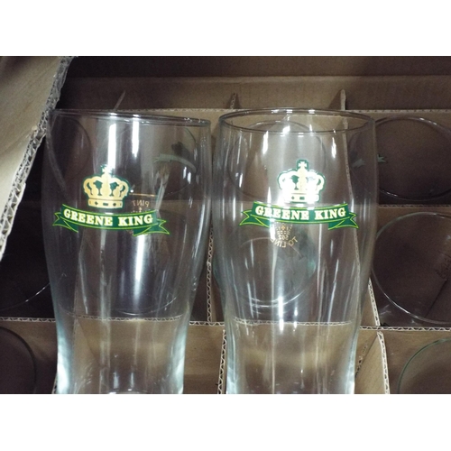 714 - 2 Boxes of Greene king pint glasses. 24 in total.