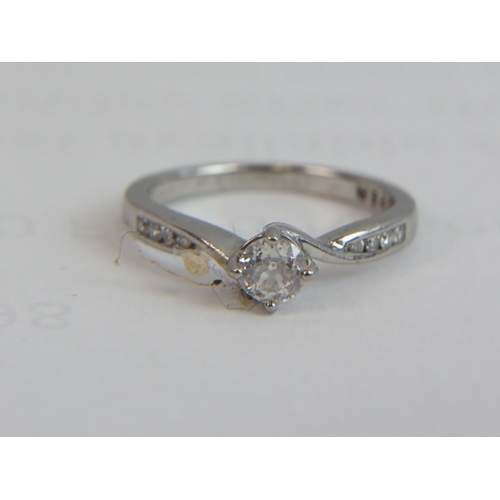 201A - 950 Palladium ring set with large central Diamond of 0.40cts plus smaller diamonds to shoulders and ... 