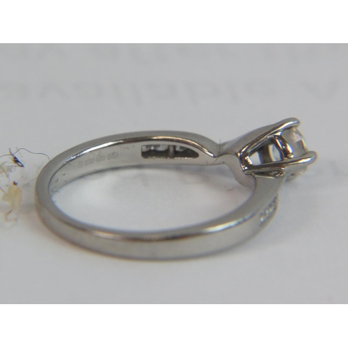 201A - 950 Palladium ring set with large central Diamond of 0.40cts plus smaller diamonds to shoulders and ... 