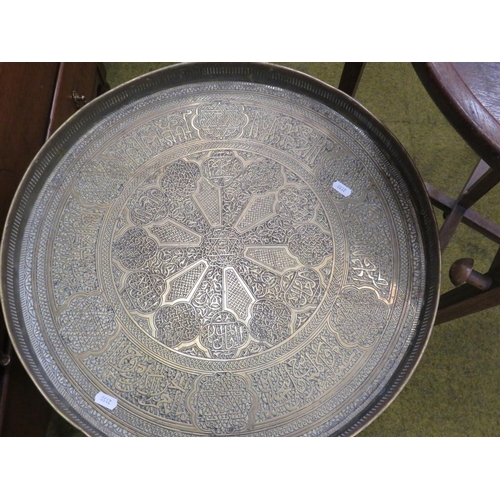 622 - Two folding tray top tables. One in brass of middle eastern design. See photos