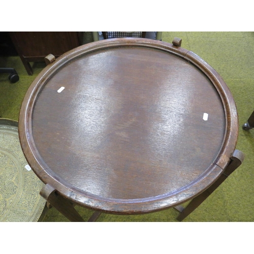 622 - Two folding tray top tables. One in brass of middle eastern design. See photos