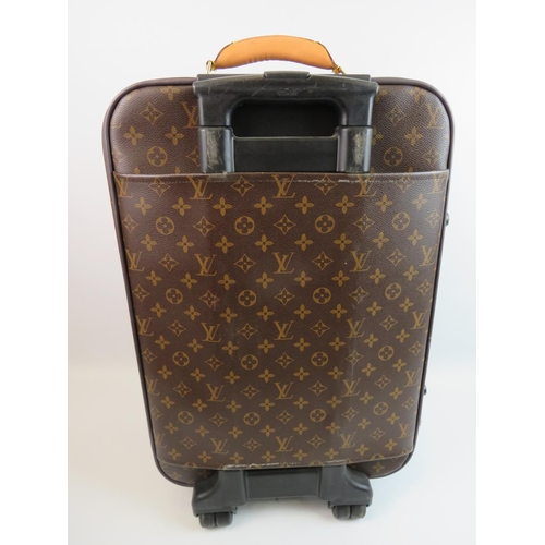 894 - Wheeled luggage bag in the style of Louis Vuitton. Originality not known. please study photographs.