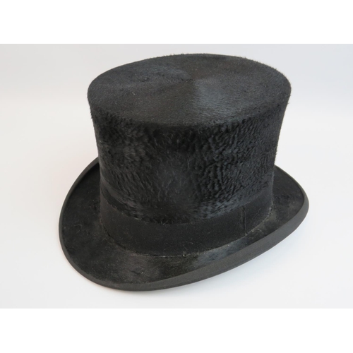 899 - G A Dunn & Co, Top hat. size seven in very good condition. see photos.