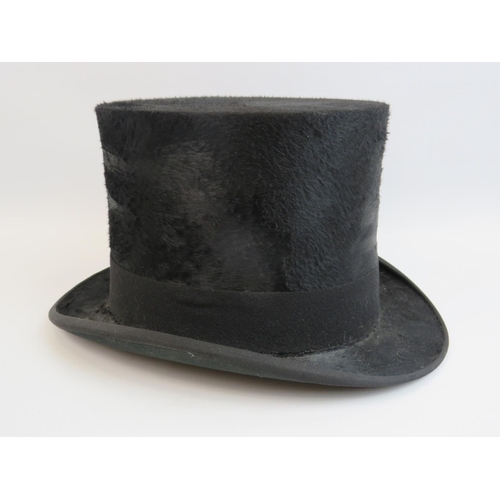 899 - G A Dunn & Co, Top hat. size seven in very good condition. see photos.