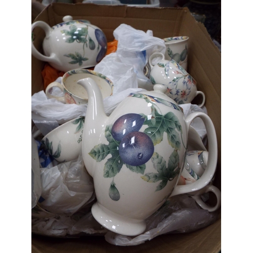 785 - 2 Boxes of barretts dinnerware and tea set in a fruit pattern.