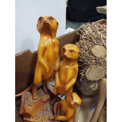 814 - Handcrafted wooden figures of ducks and meercats.