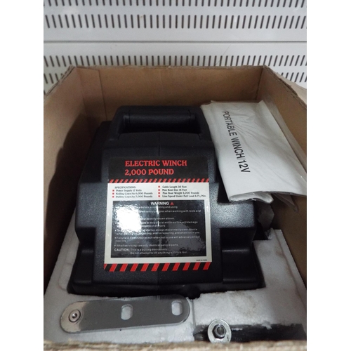 854 - 12v boat winch with original box.