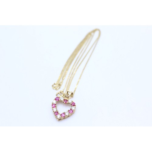 55 - 9ct gold ruby and clear gemstone heart pendant necklace (2g)       225126