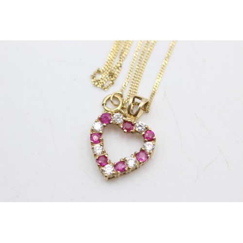 55 - 9ct gold ruby and clear gemstone heart pendant necklace (2g)       225126