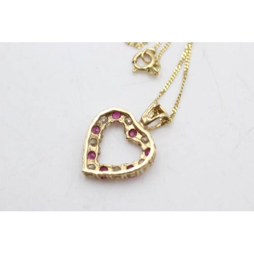 55 - 9ct gold ruby and clear gemstone heart pendant necklace (2g)       225126