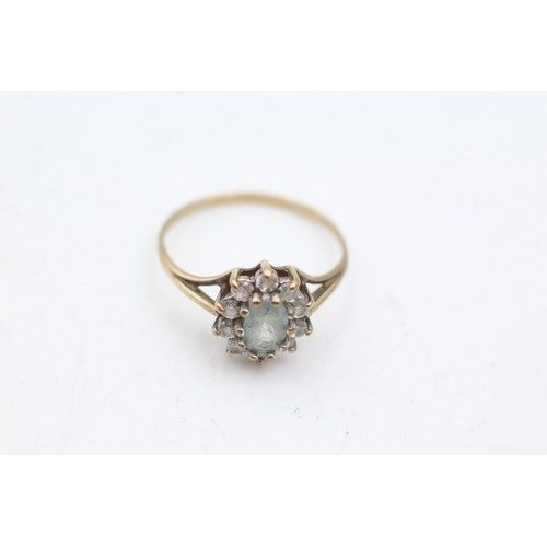 56 - 9ct gold topaz and clear gemstone ring (1.7g)       964530