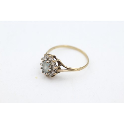 56 - 9ct gold topaz and clear gemstone ring (1.7g)       964530