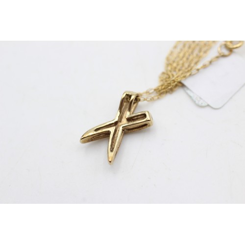 73 - 9ct gold diamond cross pendant necklace (1.5g)       914421