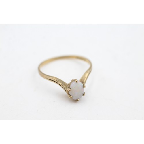 83 - 9ct gold opal solitaire ring (1.2g)      696367