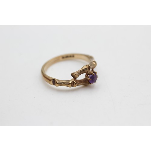 98 - 9ct gold amethyst bamboo design ring (2.6g)       612807