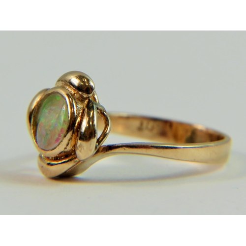 113 - 9ct Yellow Gold ring set with a re-constituted Opal.  Finger size 'L-5'   3.0g