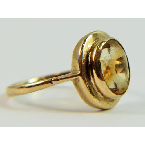 114 - 9ct Yellow Gold Cocktail ring set with a large oval Citrene. Finger size 'L'   2.5g Hallmarked for B... 