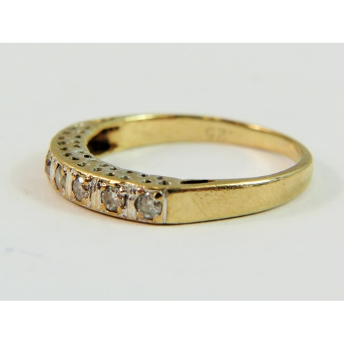 147 - 9ct Yellow Gold ring set with seven Diamonds of approx 0.25pts   Finger size 'N-5'   1.9g