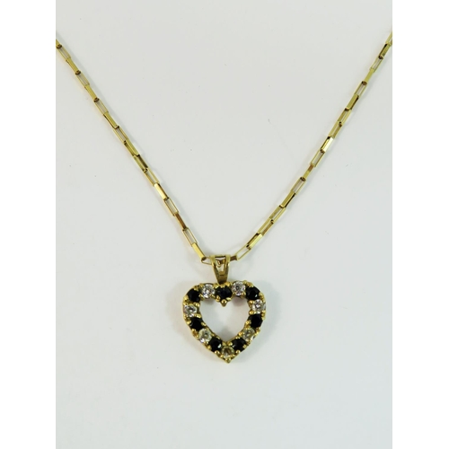 154 - 9ct  Yellow Gold Heart shaped pendant set with Coloured CZ Gemstones, hung upon a 20 inch, 9ct yello... 