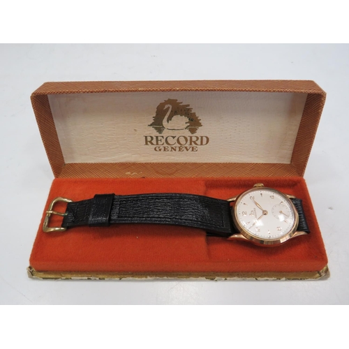 173 - Record 'Geneve' 15 Jewel Gents watch with 9ct gold case, leather strap and original box. Running ord... 