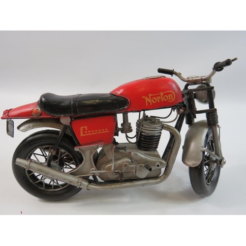 199 - Tinplate model of a Motorcycle based on a Norton Commando in good order along with a Resin model mot... 